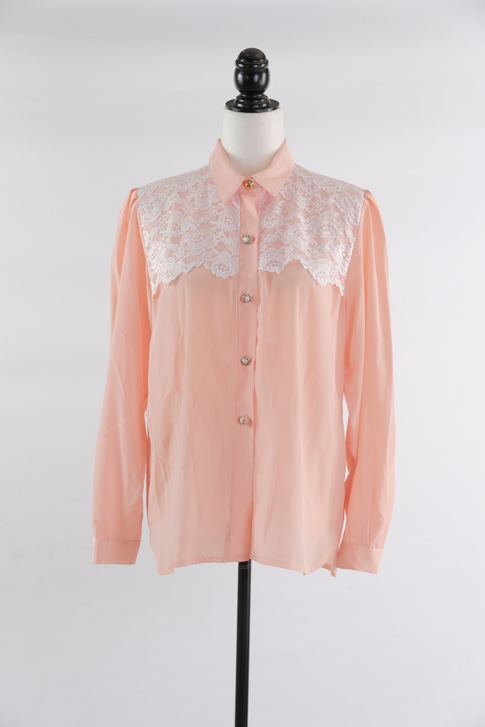 Blusa melocotón con encaje en delantero