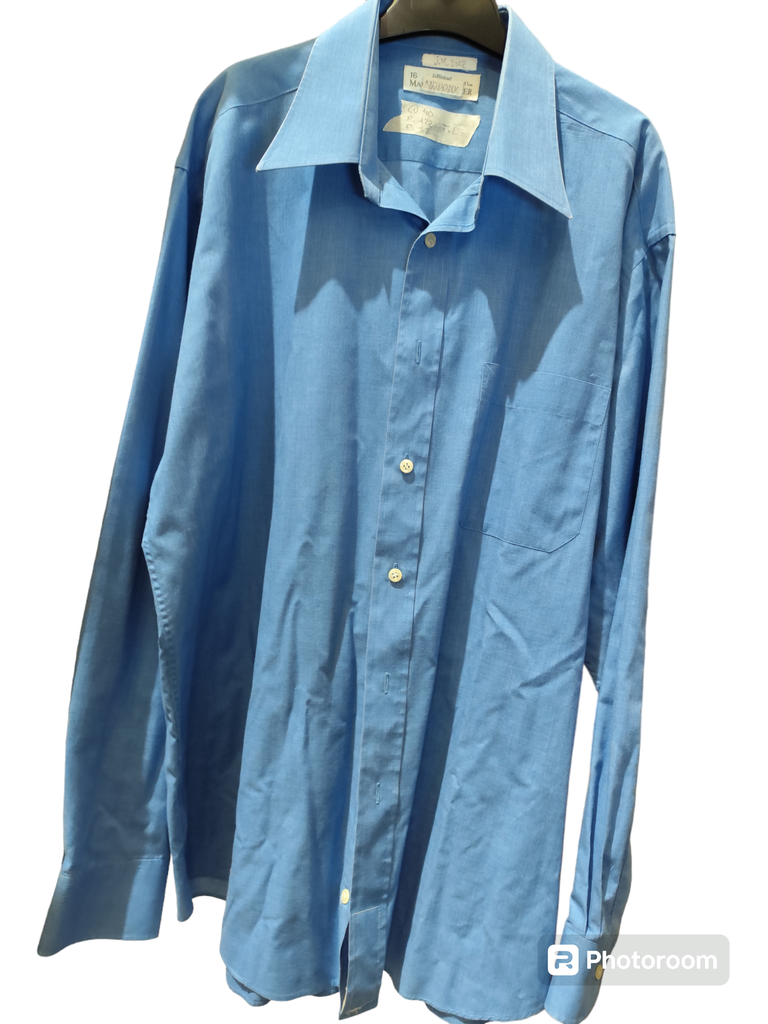 Camisa H azul bolsillo delantero